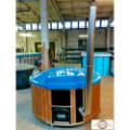 DELUXE GLASS FIBER TUB WITH INTEGRATED WOODEN FIRED HEATER