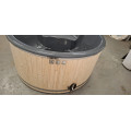 GREY GLASS FIBER HOTTUB WITH INTEGRATED WOODEN FIRED HEATER IN STOCK